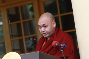 Deputy Speaker Khenpo Sonam Tenphel delivering official statement of the Tibetan Parliament.