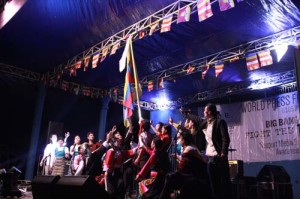 TIPA artists raising the Tibetan national flag during their performance
