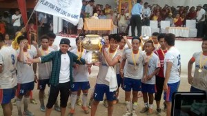 Pokhra FC players celebrating after winning the trophy.