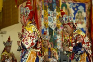 Monks from Namgyal Monastery in ritual costumes performing the Kalachakra Offering Dance on the afternoon of the seventh day of the 33rd Kalachakra Empowerment in Leh, Ladakh, J&K, India on July 9, 2014. Photo/Manuel Bauer
