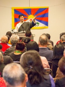 Sikyong addresses the Tibetan community in Germany and those attending His Holiness the Dalai Lama’s teachings in Hamburg, on 25 August 2014. Photo: Tibet.net