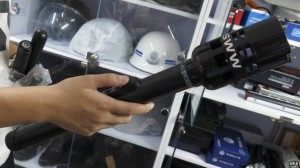 Chinese companies are making goods such as this torch, which delivers an electric shock