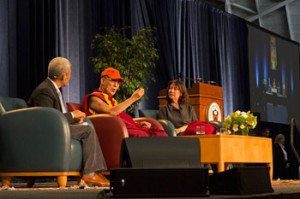 His Holiness the Dalai Lama, with Dean of Religious Life and the Chapel Rev. Dr. Alison Boden, speaking during his talk entitled “Develop the Heart” at Princeton University’s Jadwin Gym in Princeton, New Jersey on October 28, 2014. Photo/Denise Applewhite