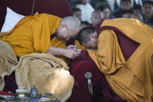 Dilgo Khentse Rinpoche greeting His Holiness the Dalai Lama at the start of prayer offerings in front of the stupa in Sankisa, UP, India on January 30, 2015. Photo/Tenzin Choejor/OHHDL
