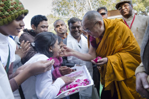 His Holiness the Dalai Lama is welcomed on his arrival at the stupa in Sankisa, UP, India on January 30, 2015. Photo/Tenzin Choejor/OHHDL
