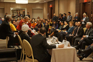 His Holiness the Dalai Lama speaking during the panel discussion on Service in Action with the American Muslim Community in Washington, DC on February 5, 2015. Photo/Jeremy Russell/OHHDL