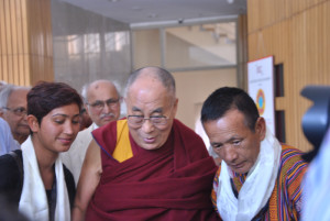 His Holiness with a delegate from Bhutan (right). 