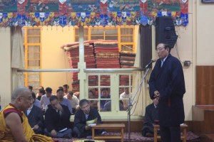 Kalon for Department of Religion, Pema Chinjhor speaking at the prayer session.