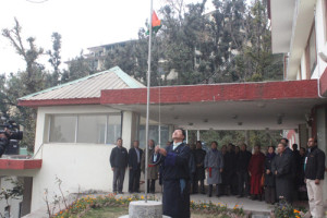 Sikyong Sangay hoisting the tri-clour Indian national flag at the Kashag Secretariat.