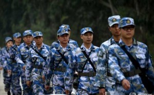 A Pentagon report said China has added more troops along the border with India.
