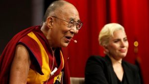 The Dalai Lama and singer Lady Gaga appear together for a question and answer session on "the global significance of building compassionate cities" at the US Conference of Mayors in Indianapolis on Sunday. (Reuters) 