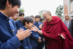 His Holiness the Dalai Lama greeting students on his arrival at Setagaya Junior High School in Tokyo, Japan on November 16, 2016. Photo/Jigme Choephel